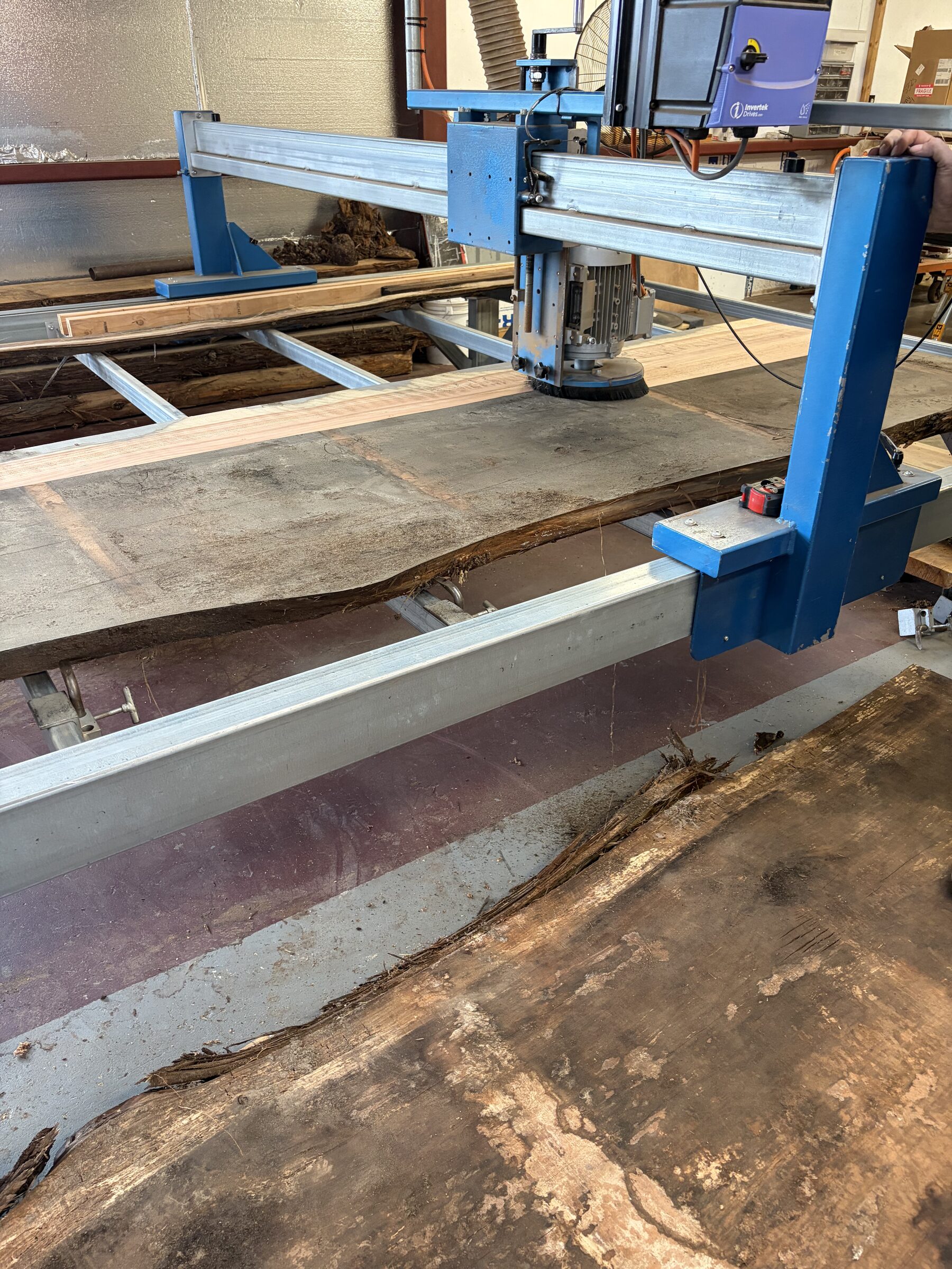 Surfacing a live edge slab on the mill